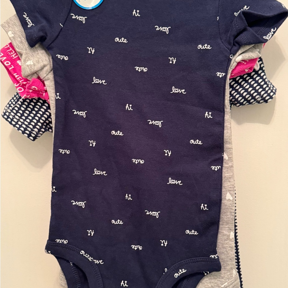 NWT set of 4 CARTER’S ONSIES. Baby Size 9 months Brand New still on hangers NEW - Picture 6 of 12